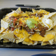 Image for article titled Nacho Smackdown: Taco Bell Vs. 7-Eleven